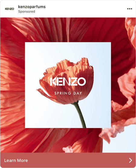 Screenshot of Instagram ad with a red flower and the text "Kenzo Spring Day"