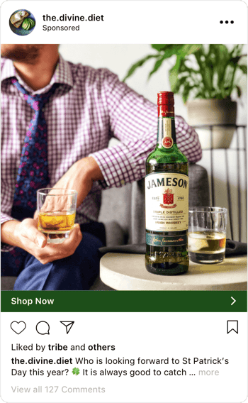 from Instagram featuring a bottle of whisky and the body of a person holding a glass of whiskey