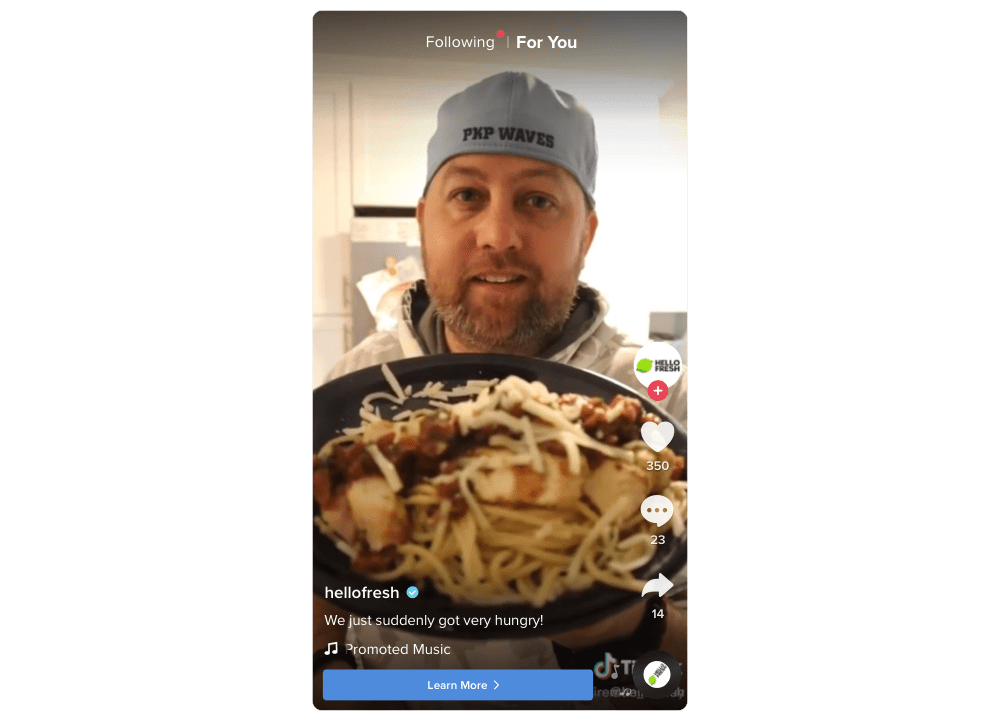 Screenshot of Hello Fresh ad on TikTok featuring man holding a plate of food