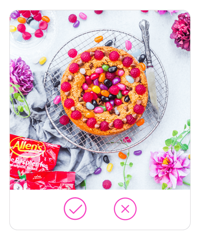 Flatlay of a colourful cake made with jelly beans