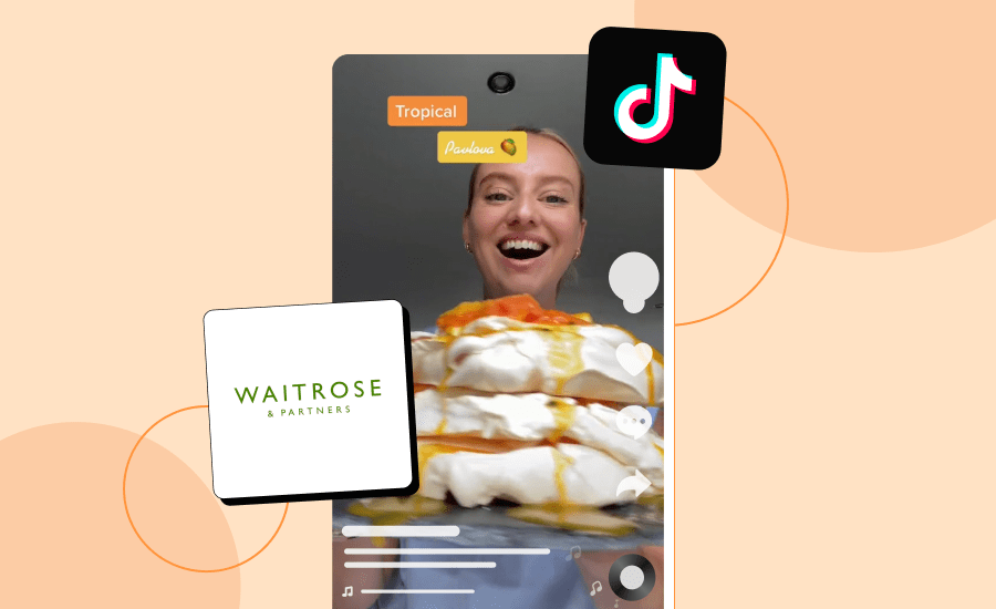 Screenshot of a TikTokker holding a pavlova and smiling